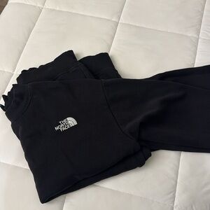 The North Face Black Hoodie with Crewneck Style and Long Sleeves